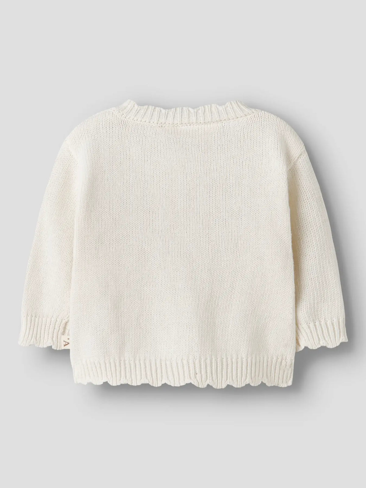 Rückansicht cremefarbener Baby-Cardigan aus Strick von Lil’ Atelier im Bärechind Winterthur Zürich Schweiz