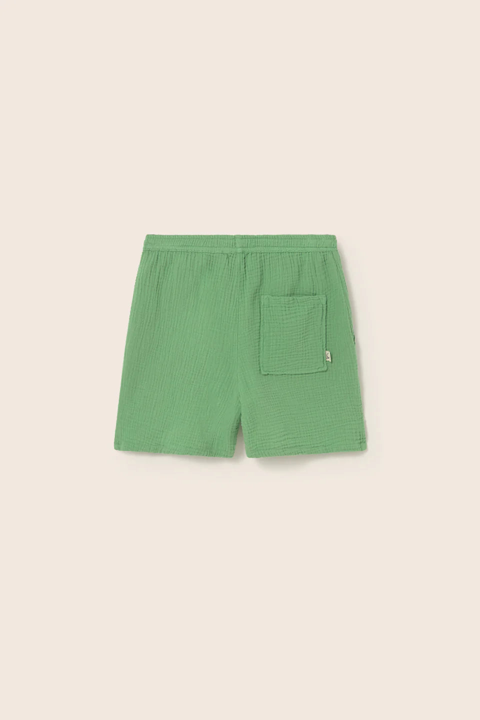Detailansicht grüne Cozmo Kinder Shorts aus Musselin mit elastischem Bund – nachhaltige Kindermode Winterthur