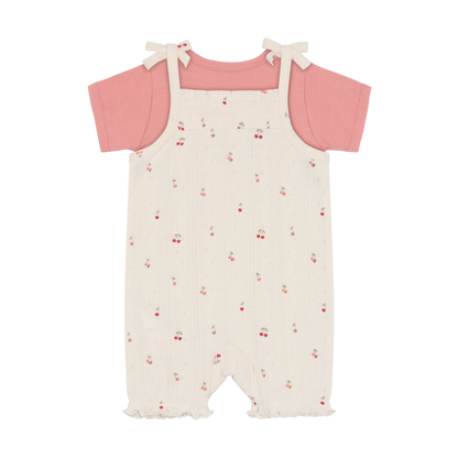 Fixoni Body und Strampler mit Kirschen aus Bio Baumwolle im Kinderladen Bärechind Winterthur Zürich Schweiz für nachhaltige Kinderkleider.