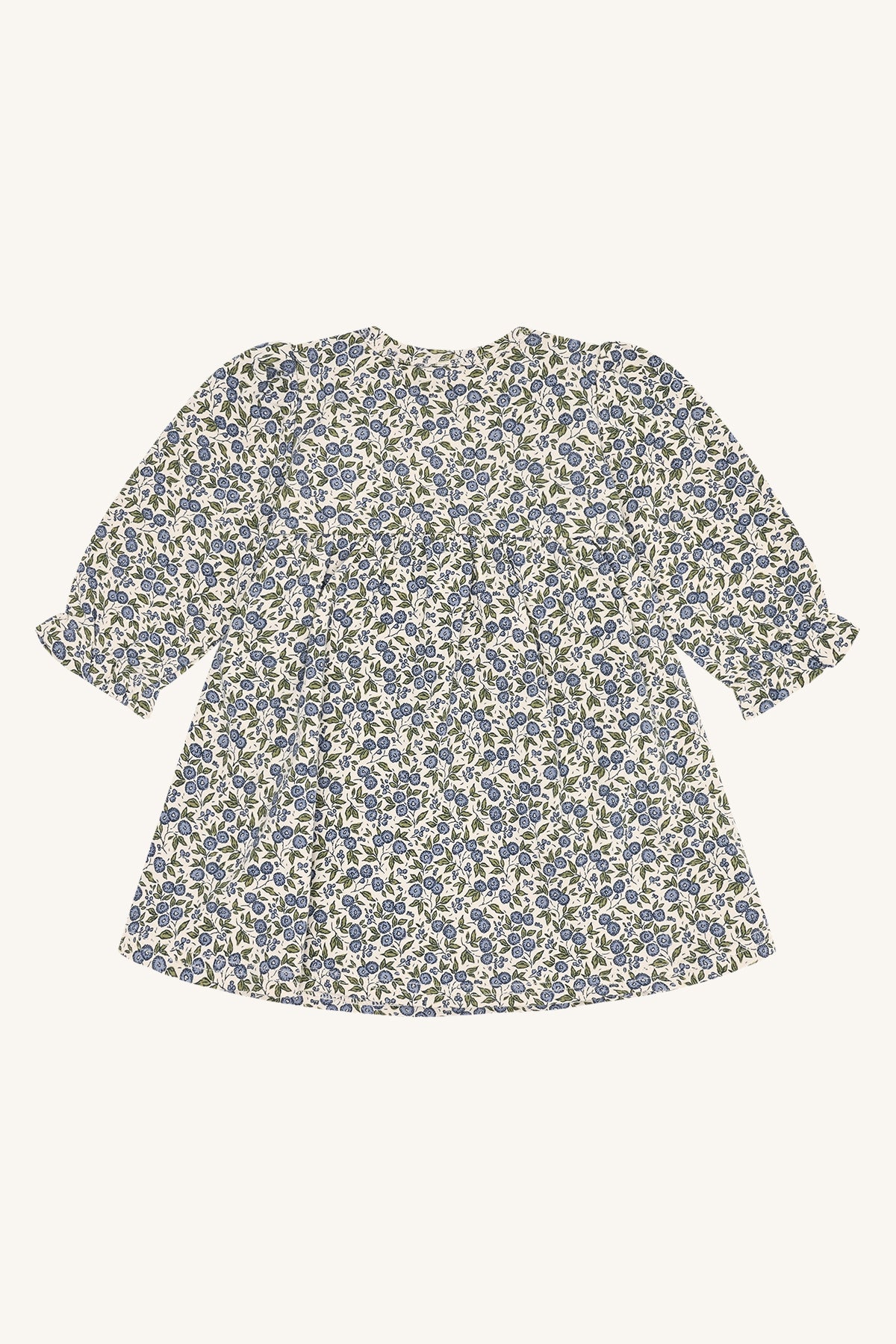 Rückansicht des Hust & Claire Kis Flora Langarmkleids mit ausgestelltem Schnitt und floralem Muster.
