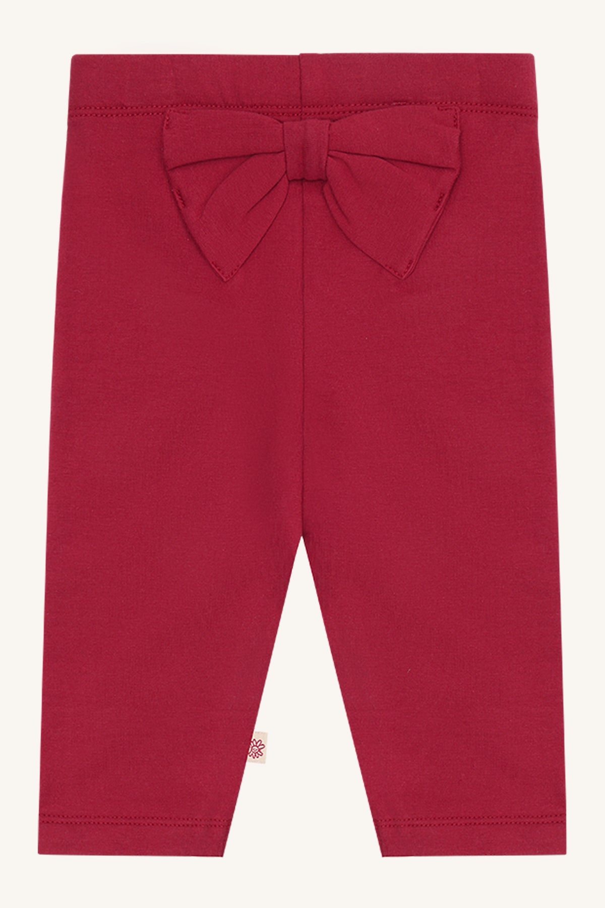 Hust & Claire Lisa Baby Leggings in Teaberry mit grosser Schleife auf der Rückseite. Babykleider im Bärechind Winterthur, Zürich, Schweiz.