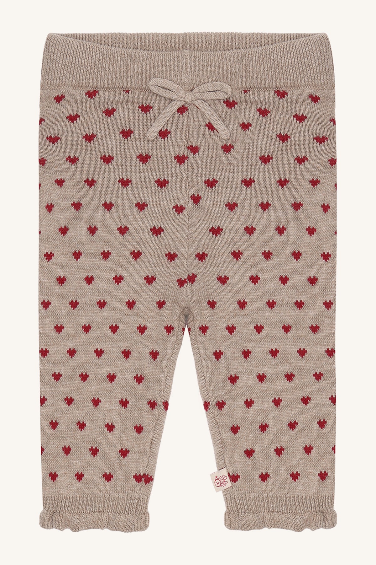 Hust & Claire Lisa Strickleggings in Biscuit mit roten Herzen, Schleife am Bund und Rüschensaum, Vorderansicht