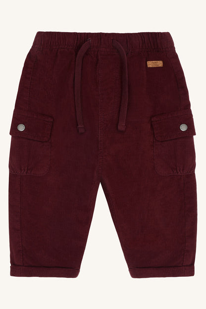 Hust & Claire Tue Cordhose in Red Chocolate, dunkelrote Babyhose aus Cord mit elastischem Bund und Cargo-Taschen, Bärechind Winterthur.