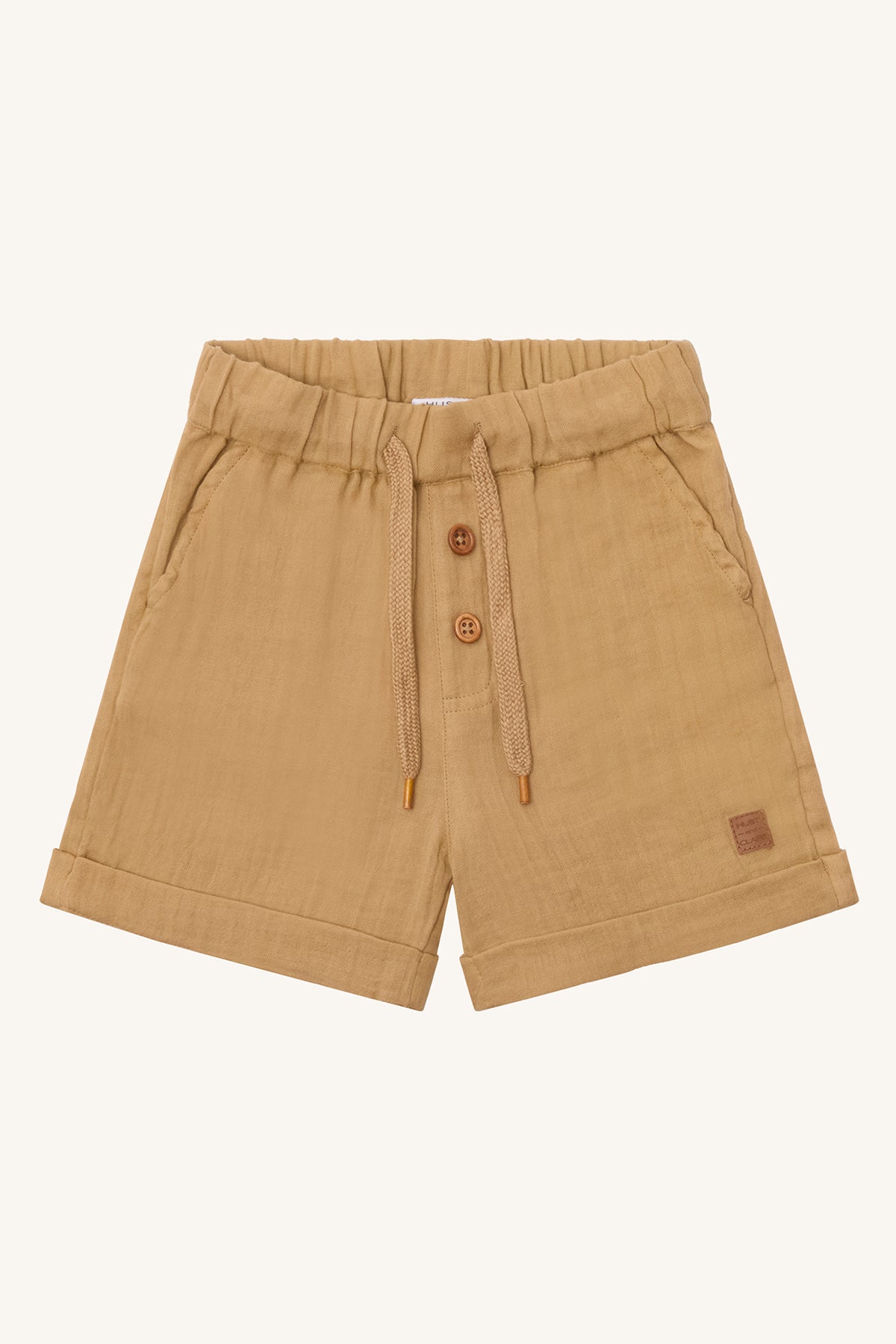 Bio-Kindershorts Haggi von Hust & Claire in Sandfarbe mit elastischem Bund – erhältlich bei Bärechind in Winterthur, Zürich, Schweiz