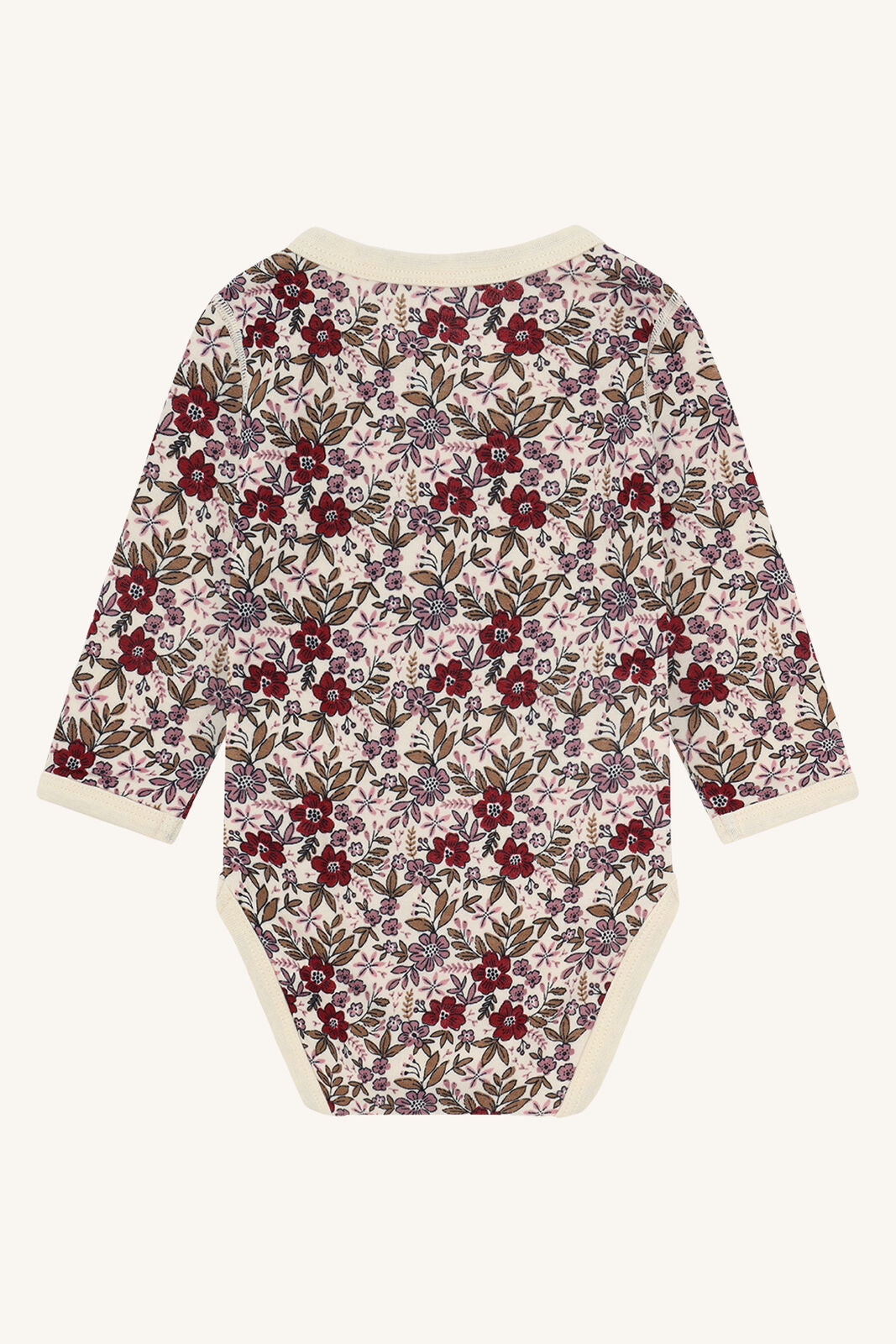 Rückansicht Hust&Claire Baloo Body aus Wolle/Bambus mit Blumenmuster – erhältlich im Bärechind Winterthur, Zürich, Schweiz.