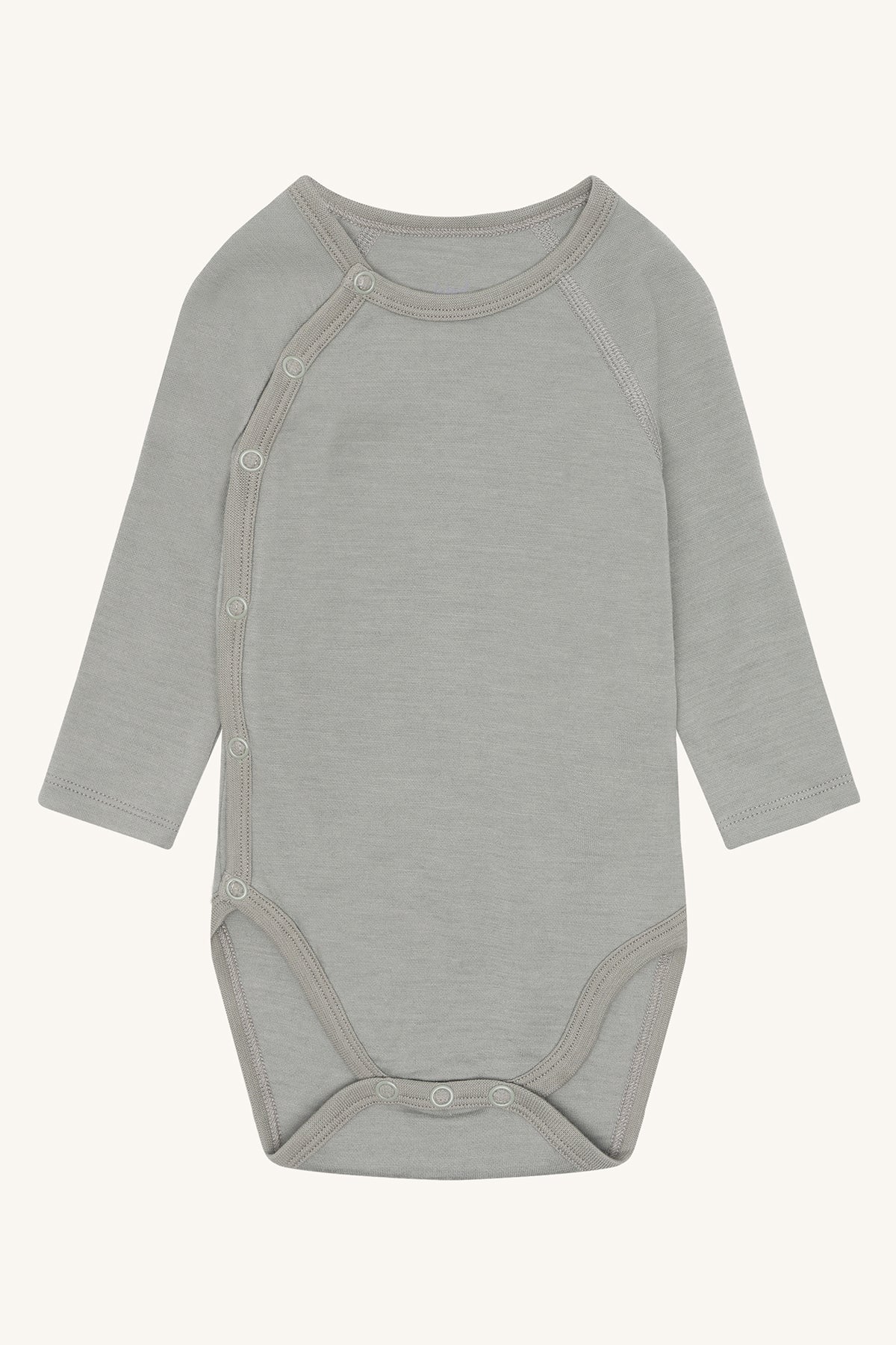 Hust&Claire Wollbody in Grau – weiche Merinowolle für Babys, erhältlich bei Bärechind Winterthur Zürich Schwei