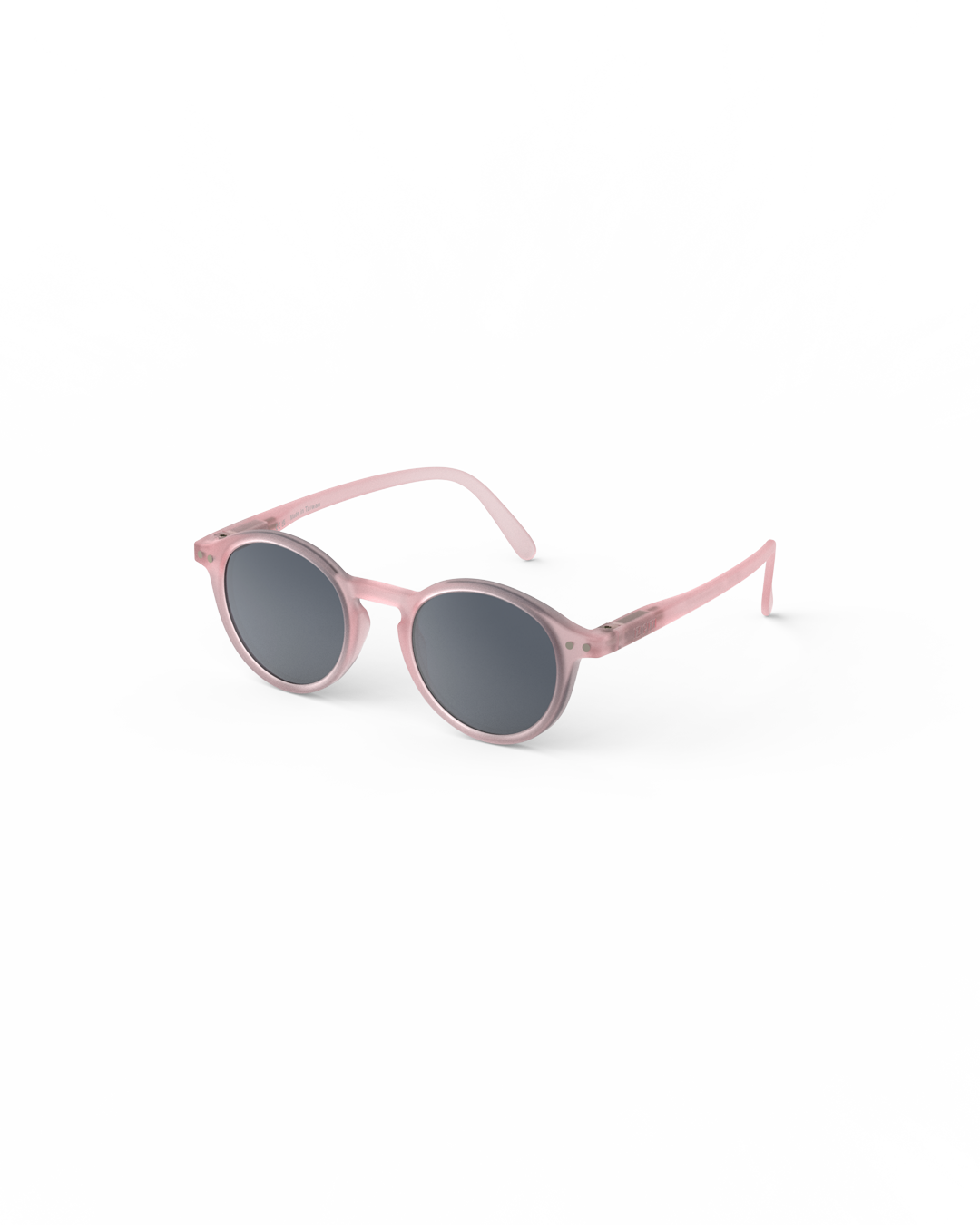Seitenansicht der IZIPIZI Kinder Sonnenbrille in Pink mit flexiblem Gestell, erhältlich im Bärechind in Winterthur bei Zürich.