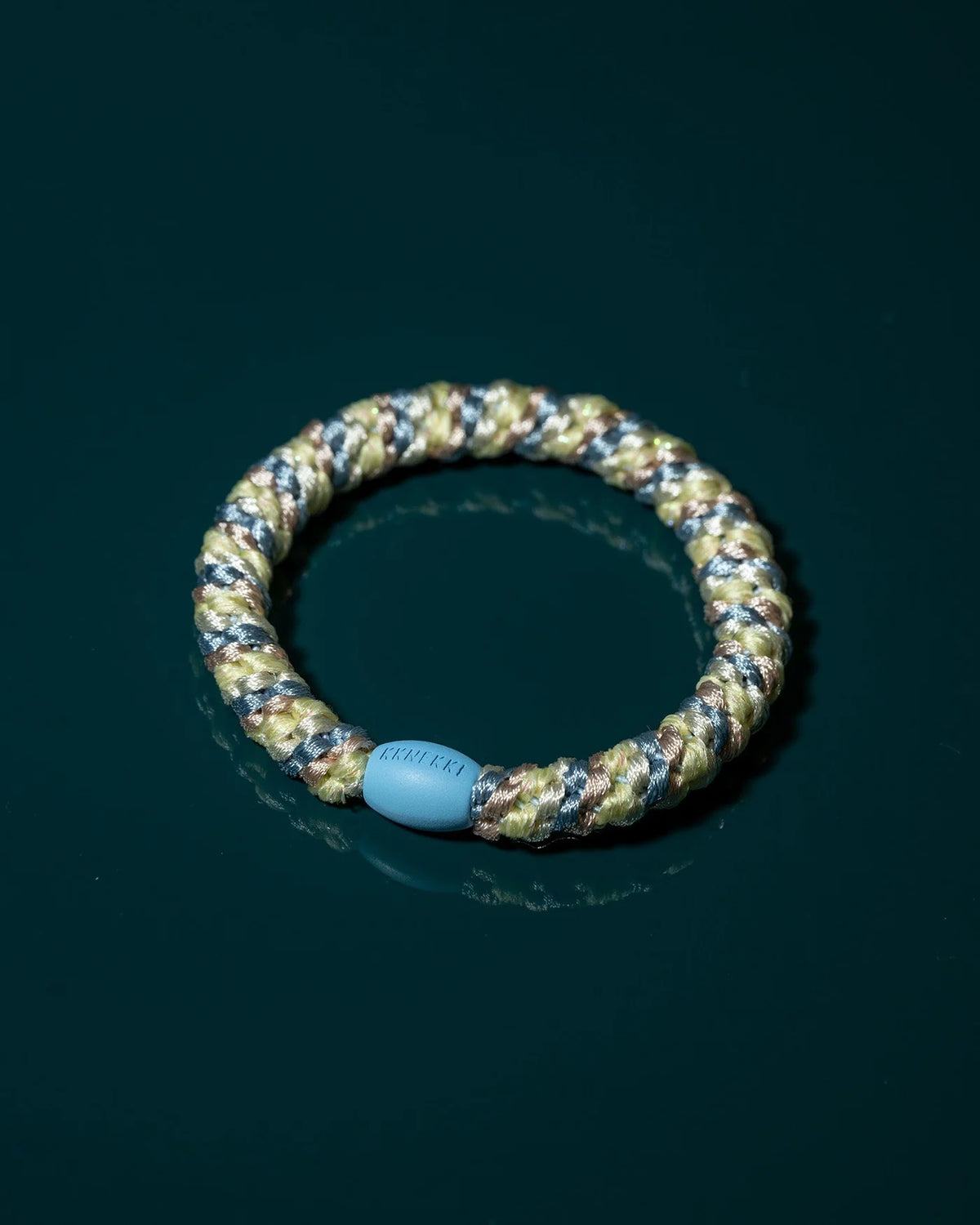 Detail KKNEKKI Haargummi mit Glitzer in Blau Gelb – Bärechind Winterthur Zürich Schweiz
