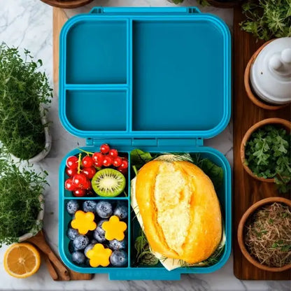 Offene petrolfarbene Lekkabox Znünibox aus Titan, gefüllt mit gesunden Snacks, erhältlich im Bärechind in Winterthur, Zürich Schweiz.