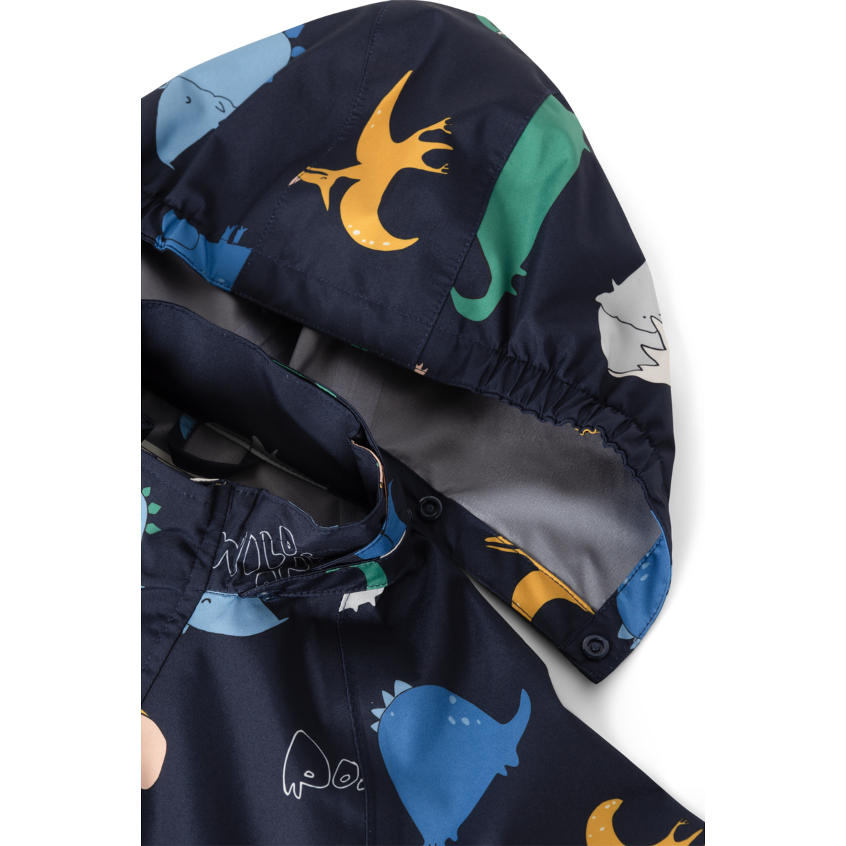 Detail der Kapuze der Liewood Pedia Regenjacke mit farbigem Dinosaurier Muster