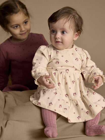Kinder tragen Minymo Bodykleid mit Blumenprint in Pink Tint