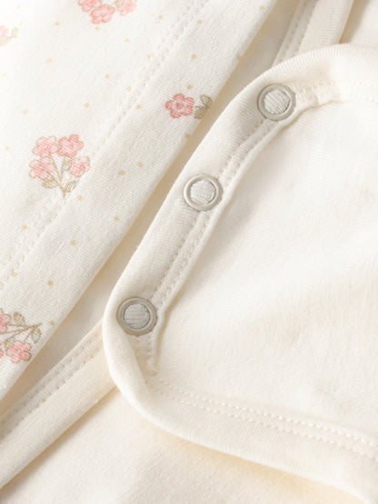 Detailansicht Minymo Body Kleid aus Bio Baumwolle mit Blumen im Bärechind Kinderladen Winterthur Zürich Schweiz