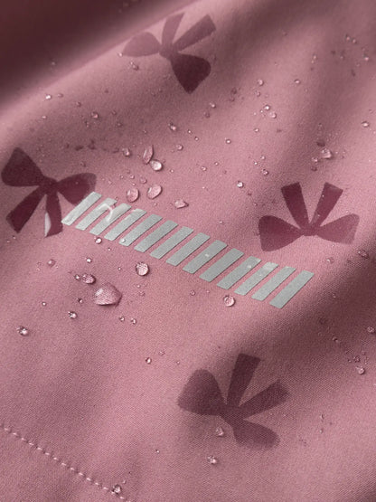 Name It Kinder Softshelljacke Mauve mit sichtbarem Muster bei Nässe und Regen Effekt