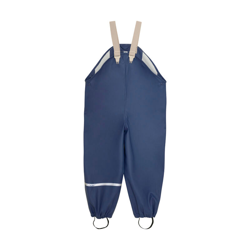 Wasserdichte Kinderregenhose in Navy mit verstellbaren Trägern – erhältlich bei Bärechind in Winterthur, Zürich, Schweiz.