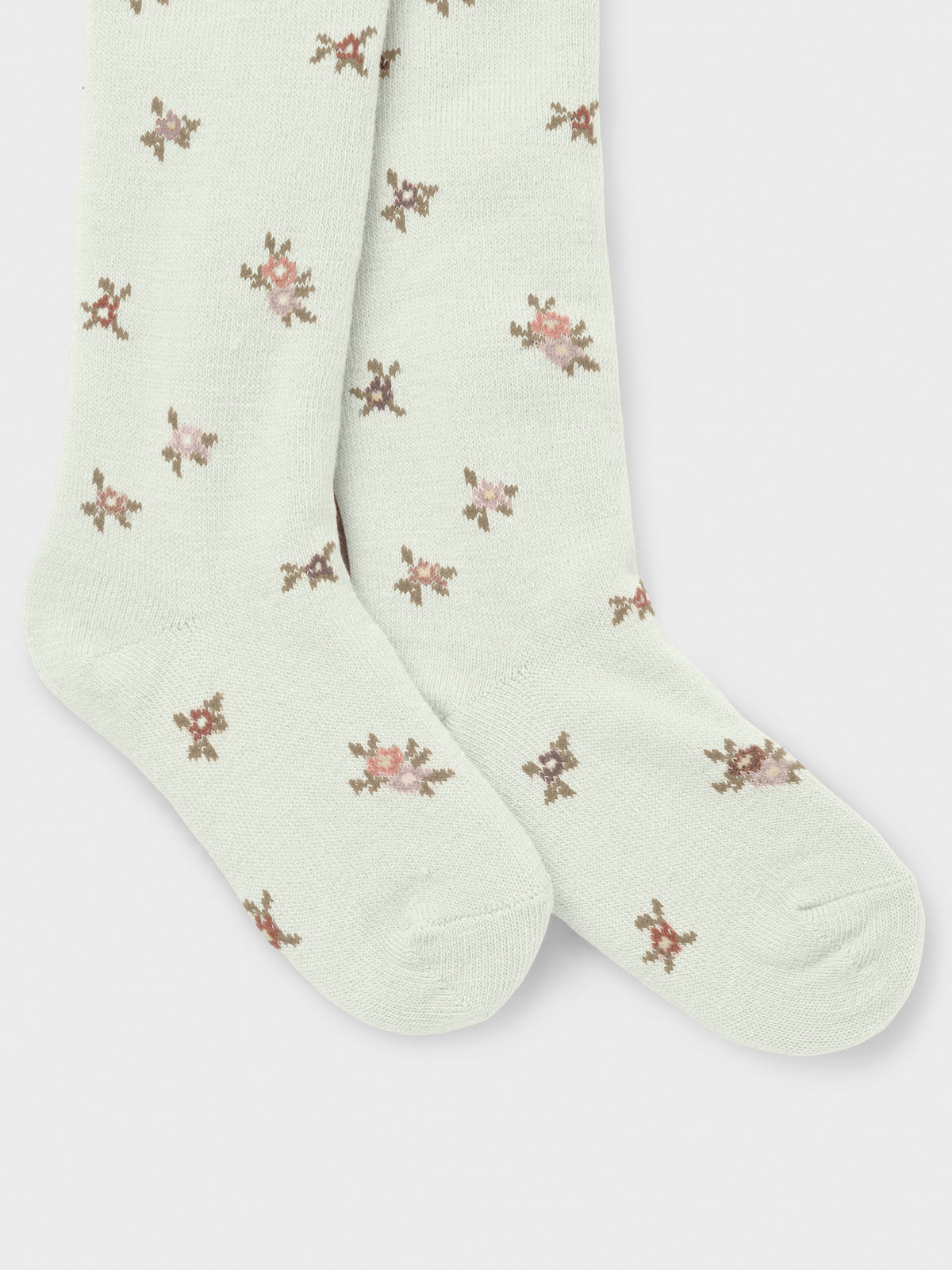 Vorderansicht weisse Wollstrumpfhose mit Blumenmuster für Kinder, Bärechind, Winterthur, Zürich Schweiz